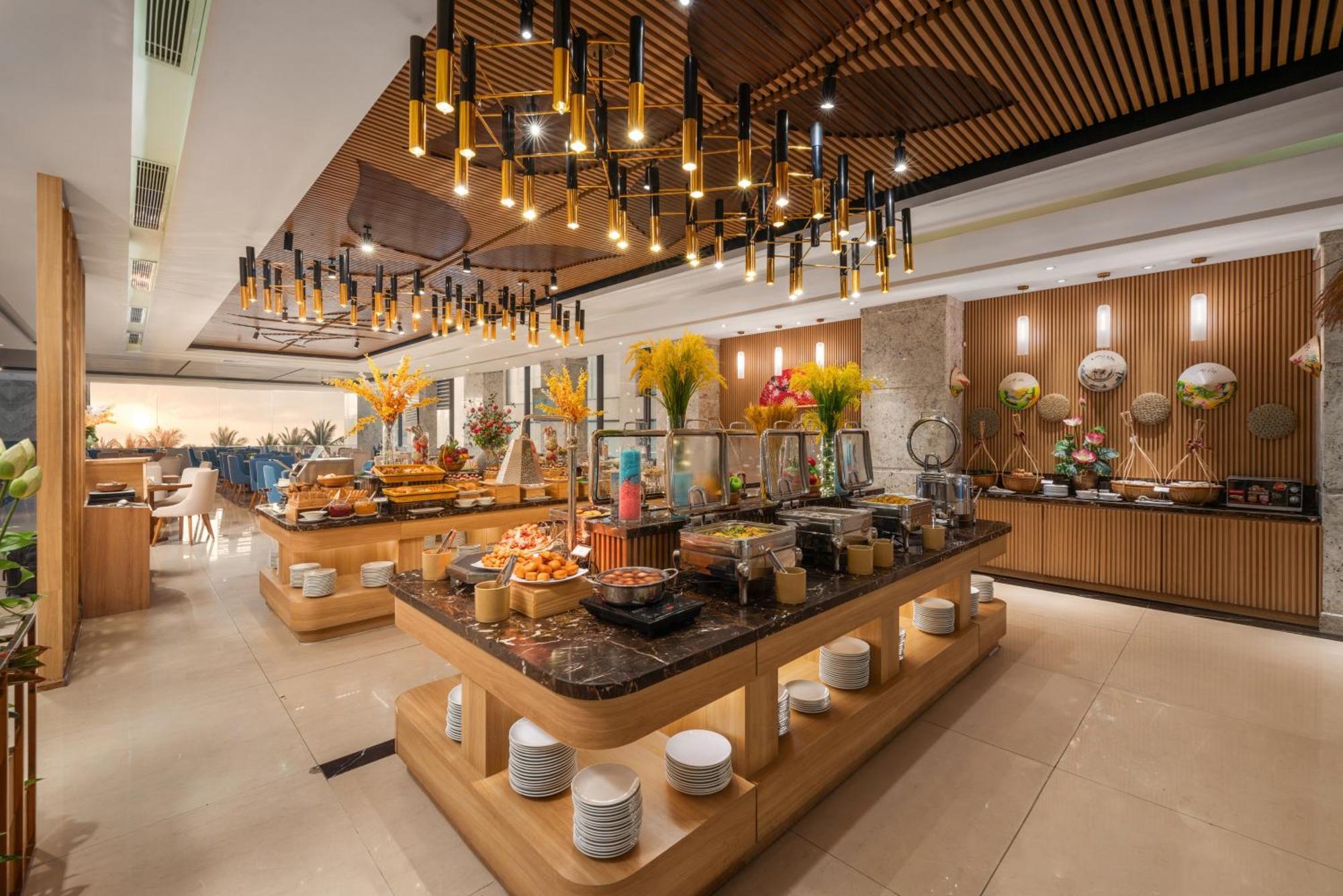 แคนวาส ดานัง บีช โอเทล Hotel ภายนอก รูปภาพ